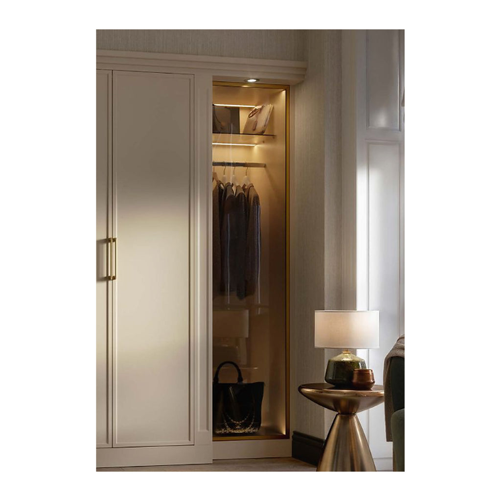 Brass aluminium smoked glass cabinet doors fitted to a wardrobe